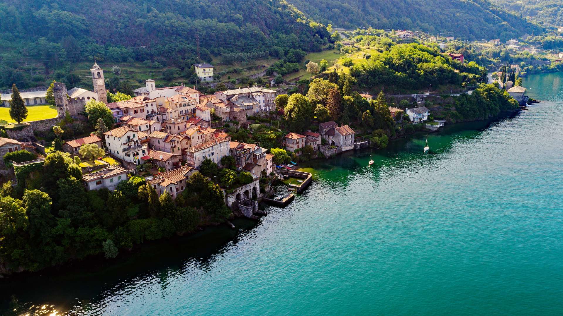 corenno plinio, a medieval village on lake como to visit by boat with organised boat tour